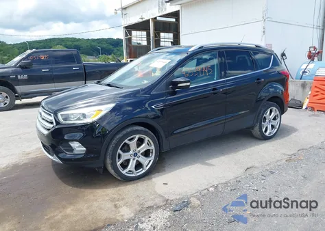 2019 Ford Escape Titanium z USA, uszkodzony, nr VIN 1FMCU9J95KUA09190